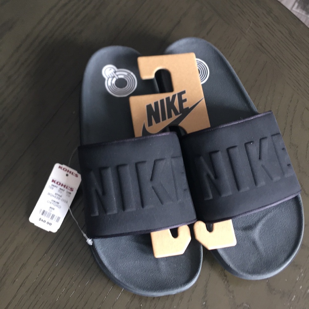 Brand new Nike slip ons
